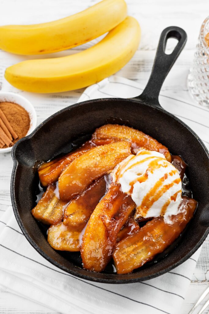 Homemade,Fried,Bananas,Foster,With,Cinnamon,And,Ice,Cream,In