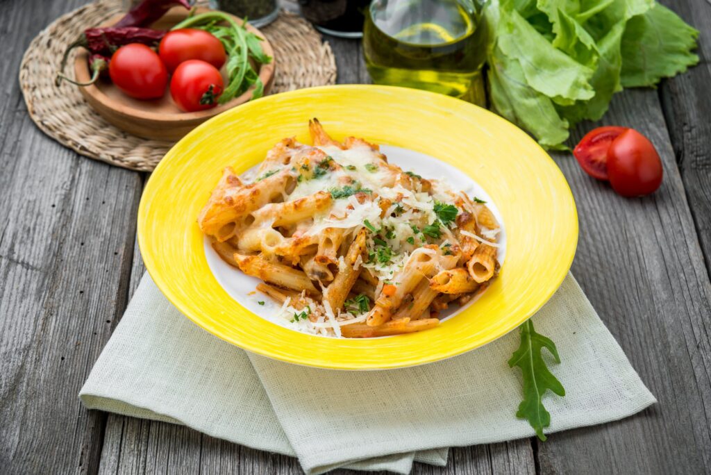 Sausage,Spinach,Ricotta,Casserole,On,Wood,Background