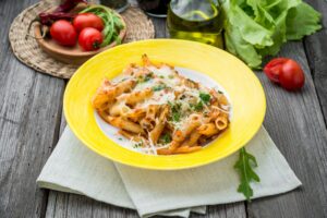 Sausage,Spinach,Ricotta,Casserole,On,Wood,Background